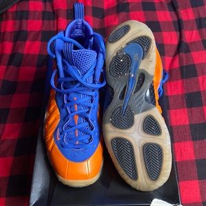 Blue and orange Nike little posite one
